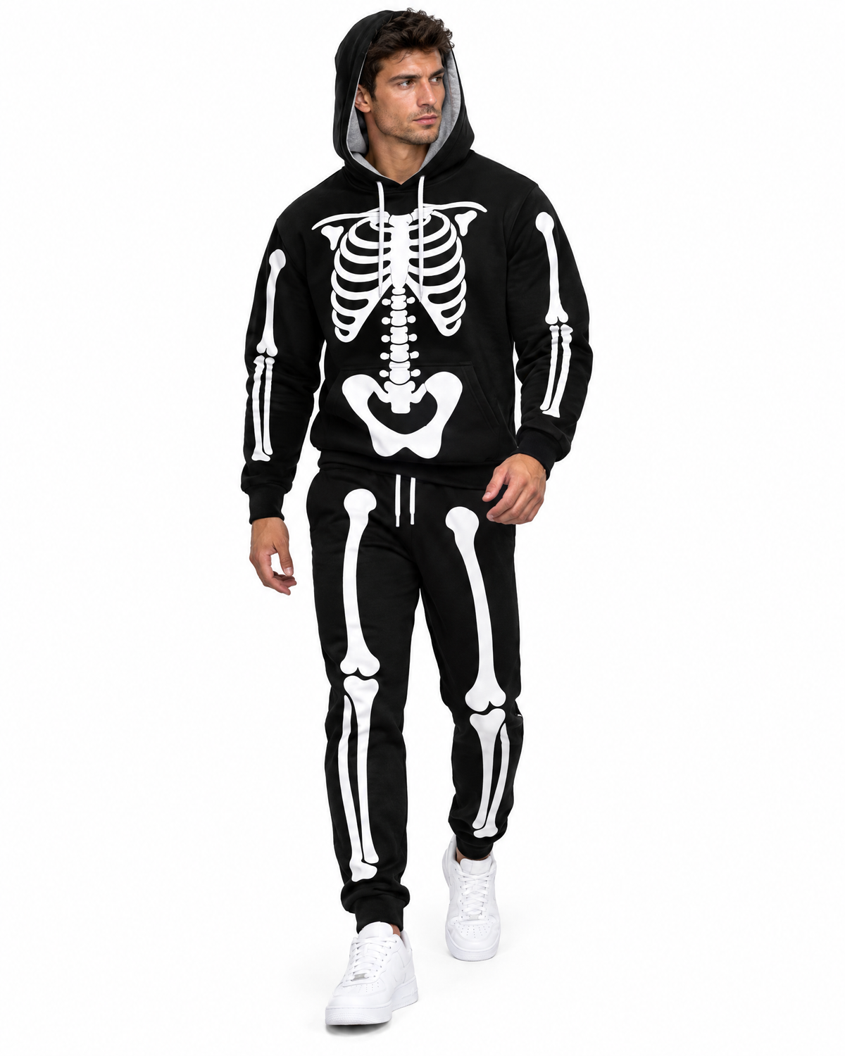 Man walking in the Skele-Oodie skeleton set with the hood up